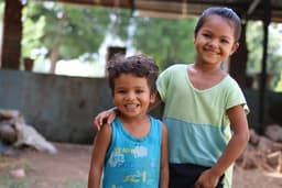 Smiling siblings — family and joy